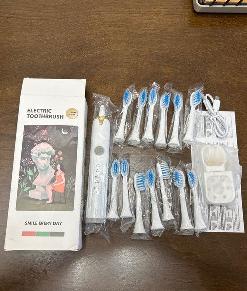 전동칫솔 2 세트 (replacement heads 13개 포함)