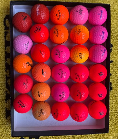 Red color used golf ball