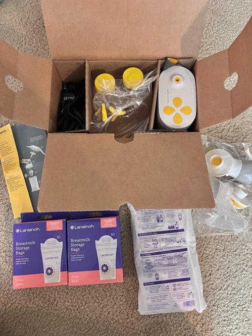 Medela 유축기 + 수동 유축기+ 2 sets of extra parts + 모유보관팩